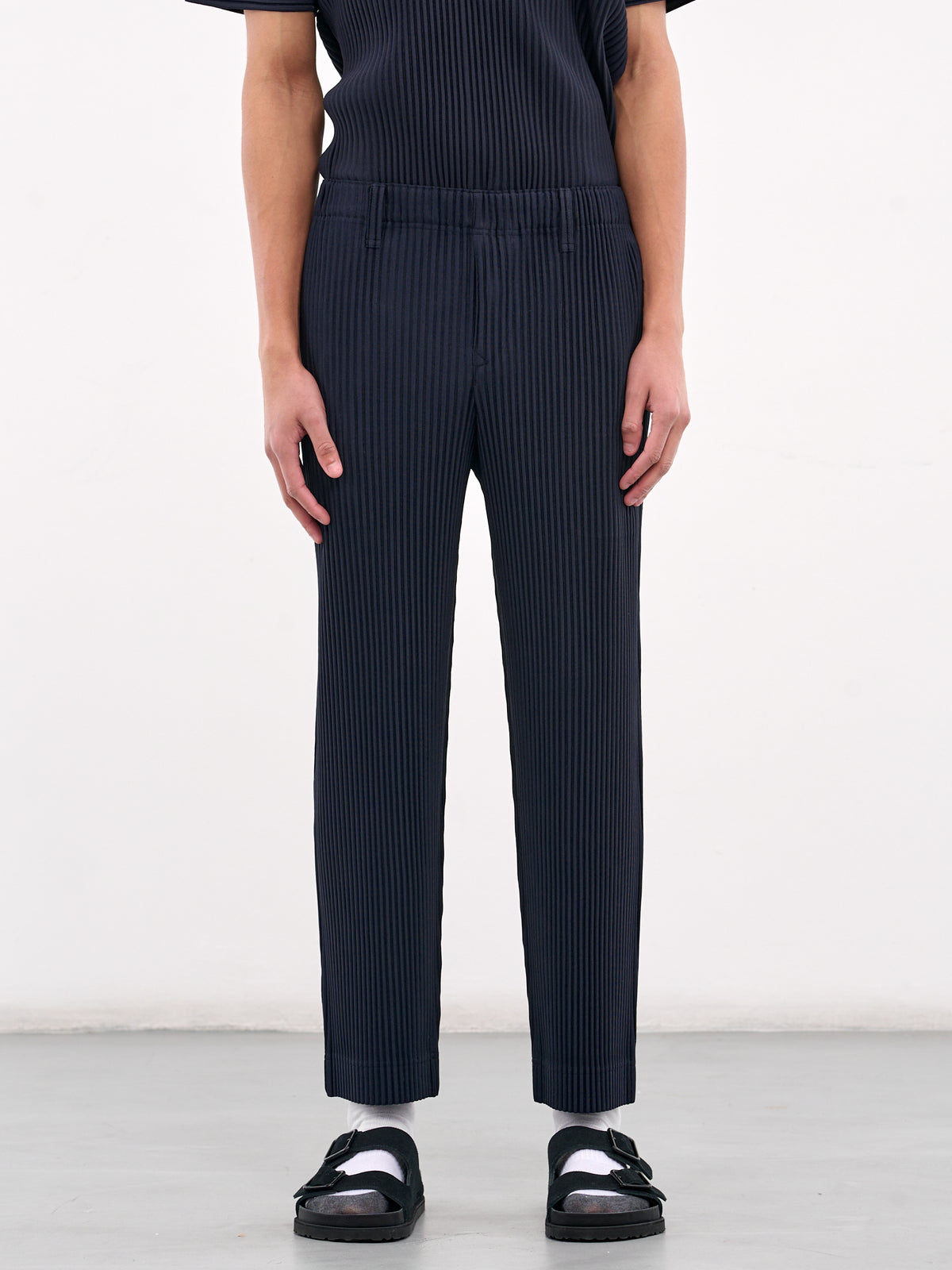 HOMME PLISSÉ ISSEY MIYAKE Basic Pleated Trousers | H. Lorenzo - front