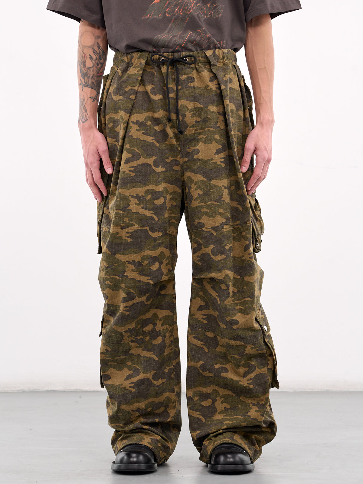 WE11DONE Camo Cargo Pants | H. Lorenzo - front