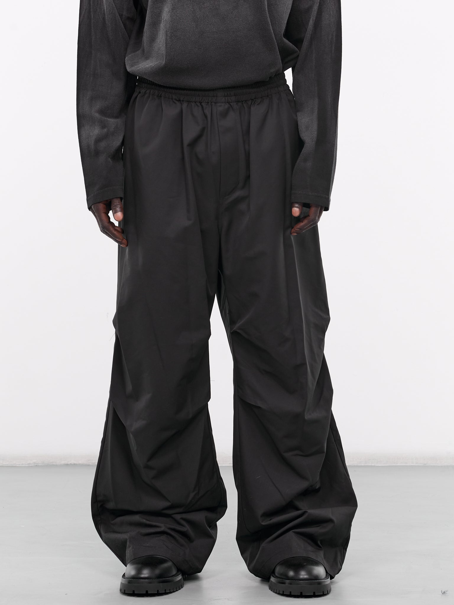 WE11DONE Track Pants | H. Lorenzo - front