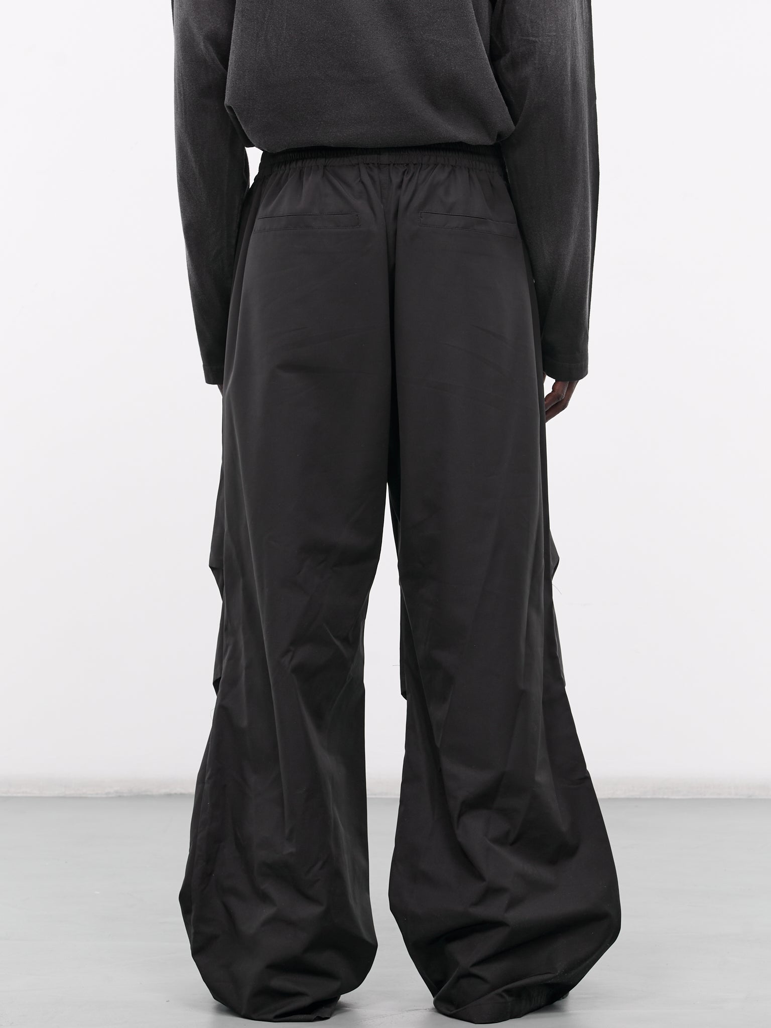 WE11DONE Track Pants | H. Lorenzo - back